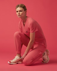 Women wearing pink scrubs.