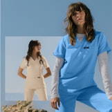 healthcare workers in the desert wearing sand colors and sky colored scrubs