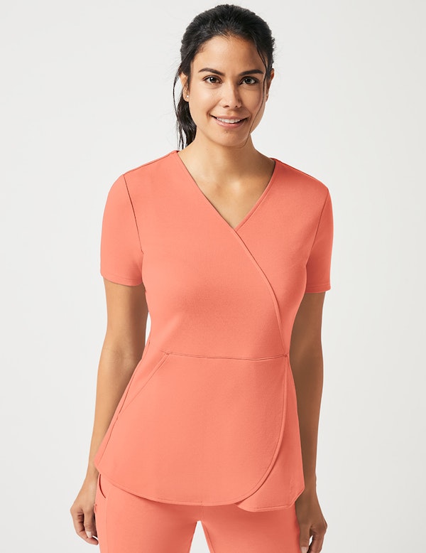 Mock Wrap Tulip Top in Melon Medical Scrubs by Jaanuu