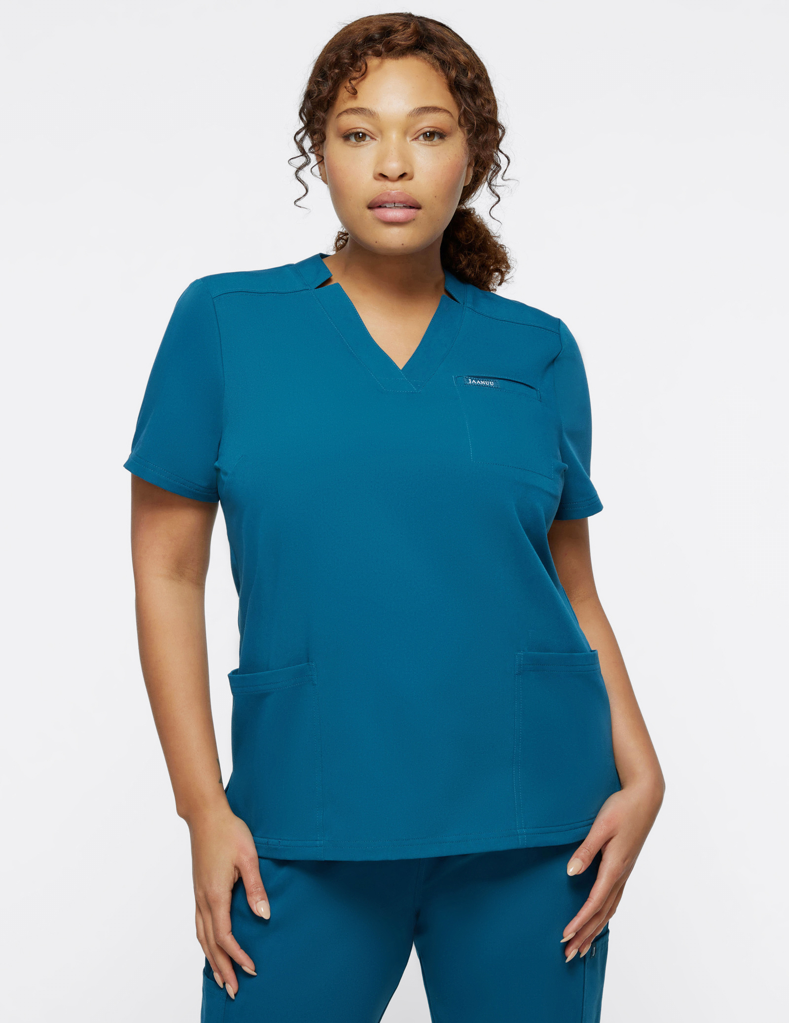 Women S Caribbean Blue Relaxed 3 Pocket Scrub Top Jaanuu   E45d9e506fabc9a45700c6509c66d2356a635621 