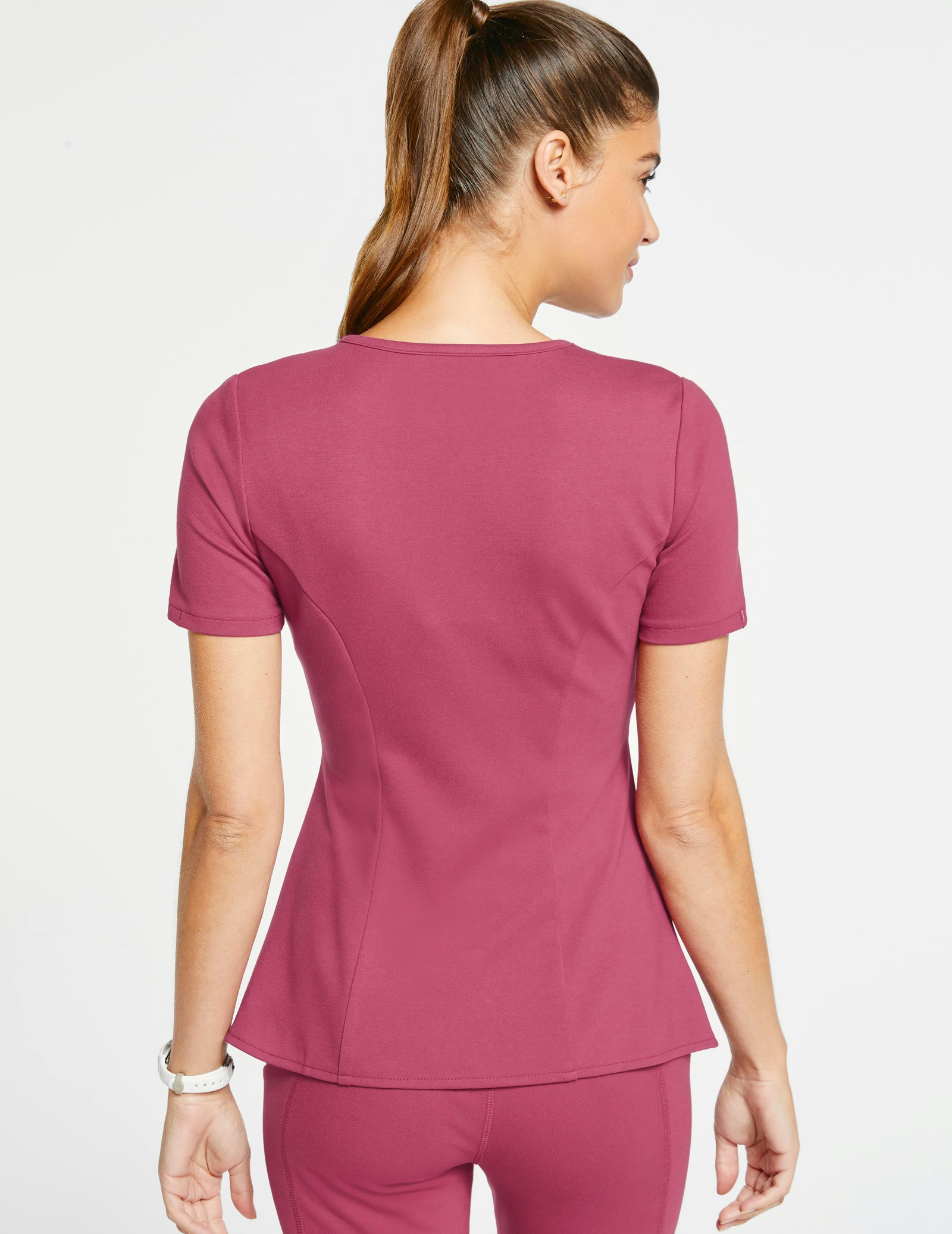Women's MockWrap Tulip Top in Warm Berry Medical Scrubs by Jaanuu