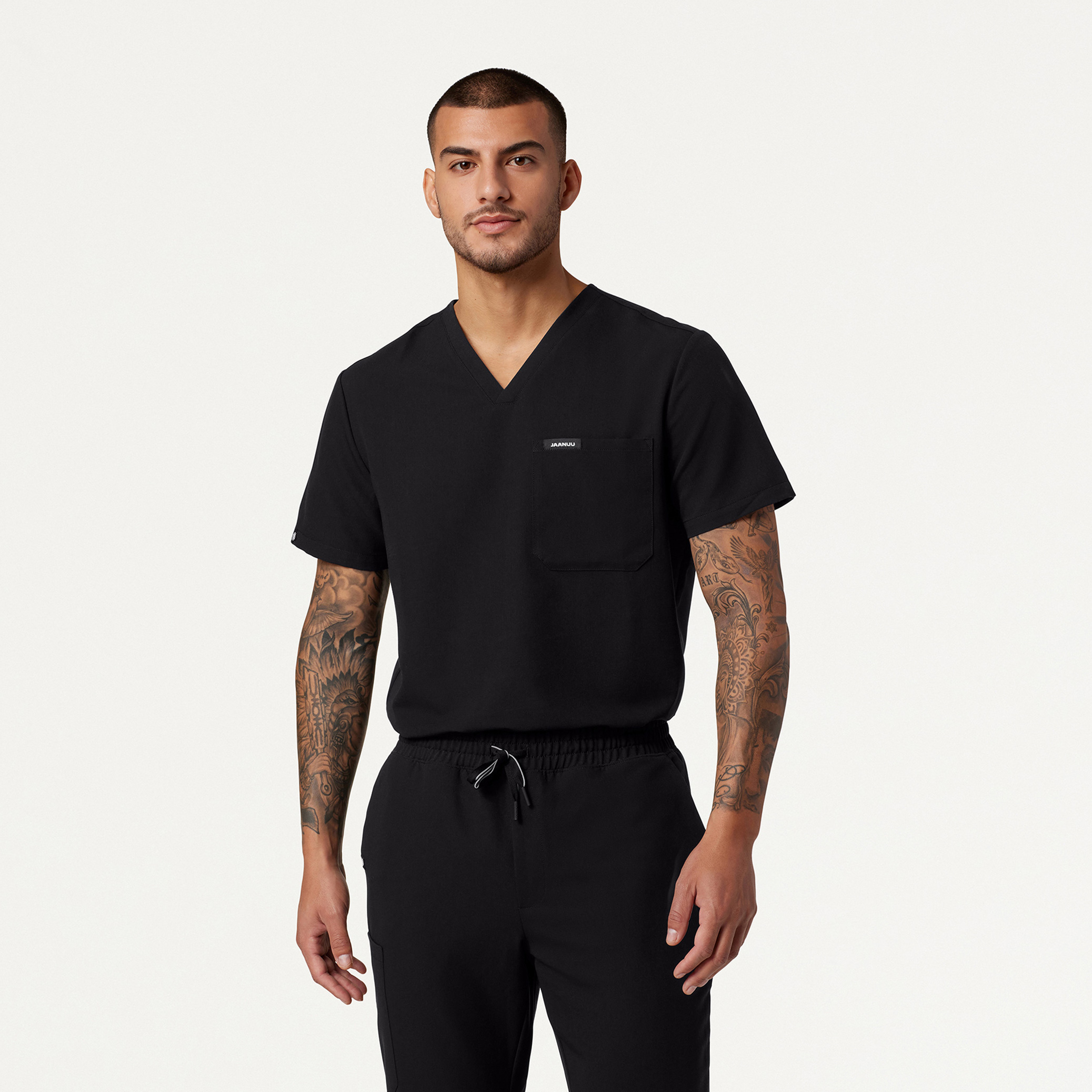 Holmes Classic Scrub Top in Black - Men's Tops by Jaanuu