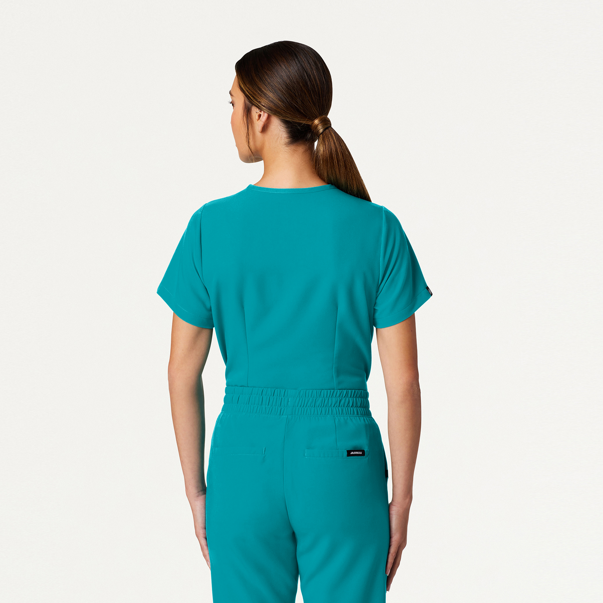 Rhena Essential 1Pocket Scrub Top in Aqua Women's Tops by Jaanuu