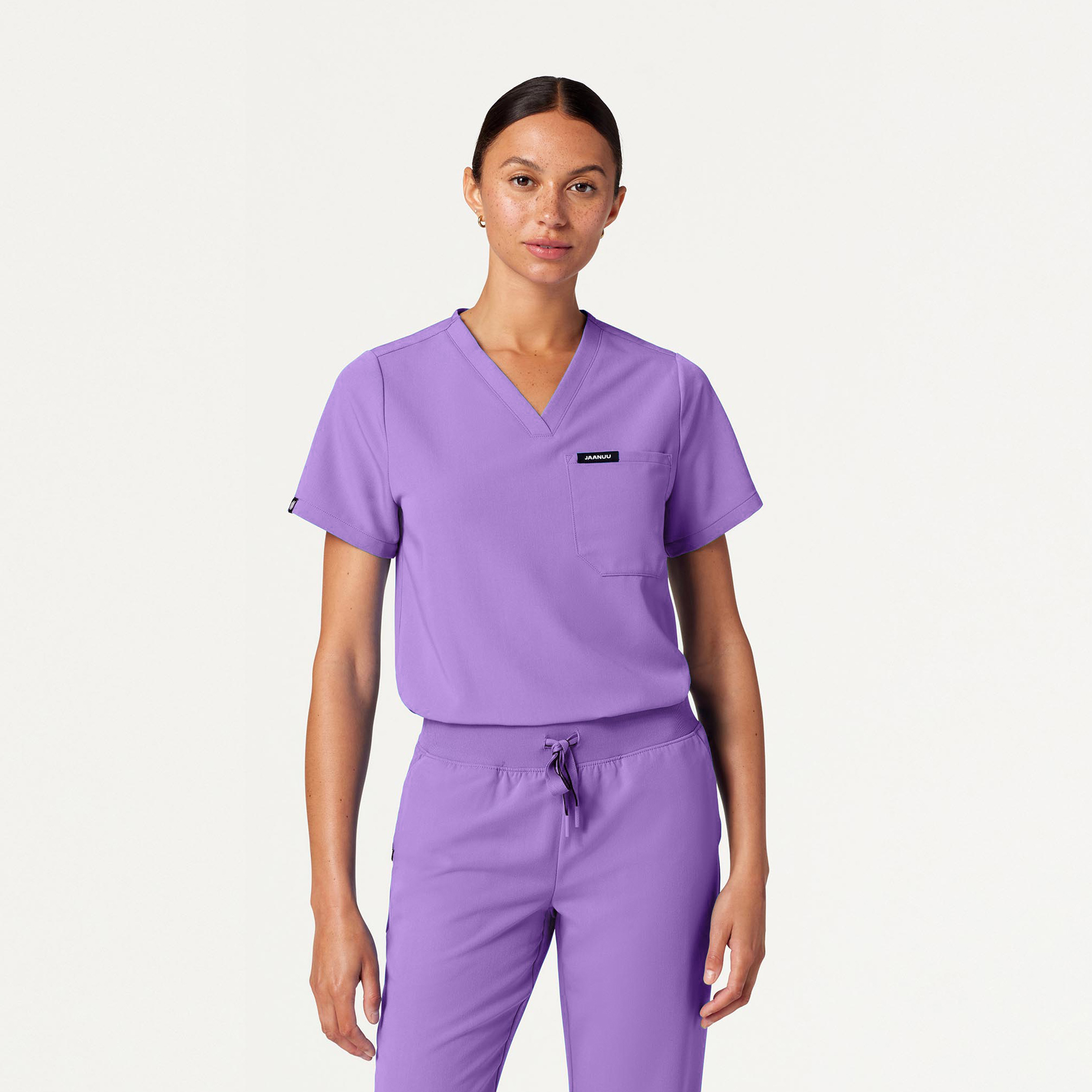 Rhena 1-Pocket Classic Scrub Top in Lilac - Women's Tops by Jaanuu