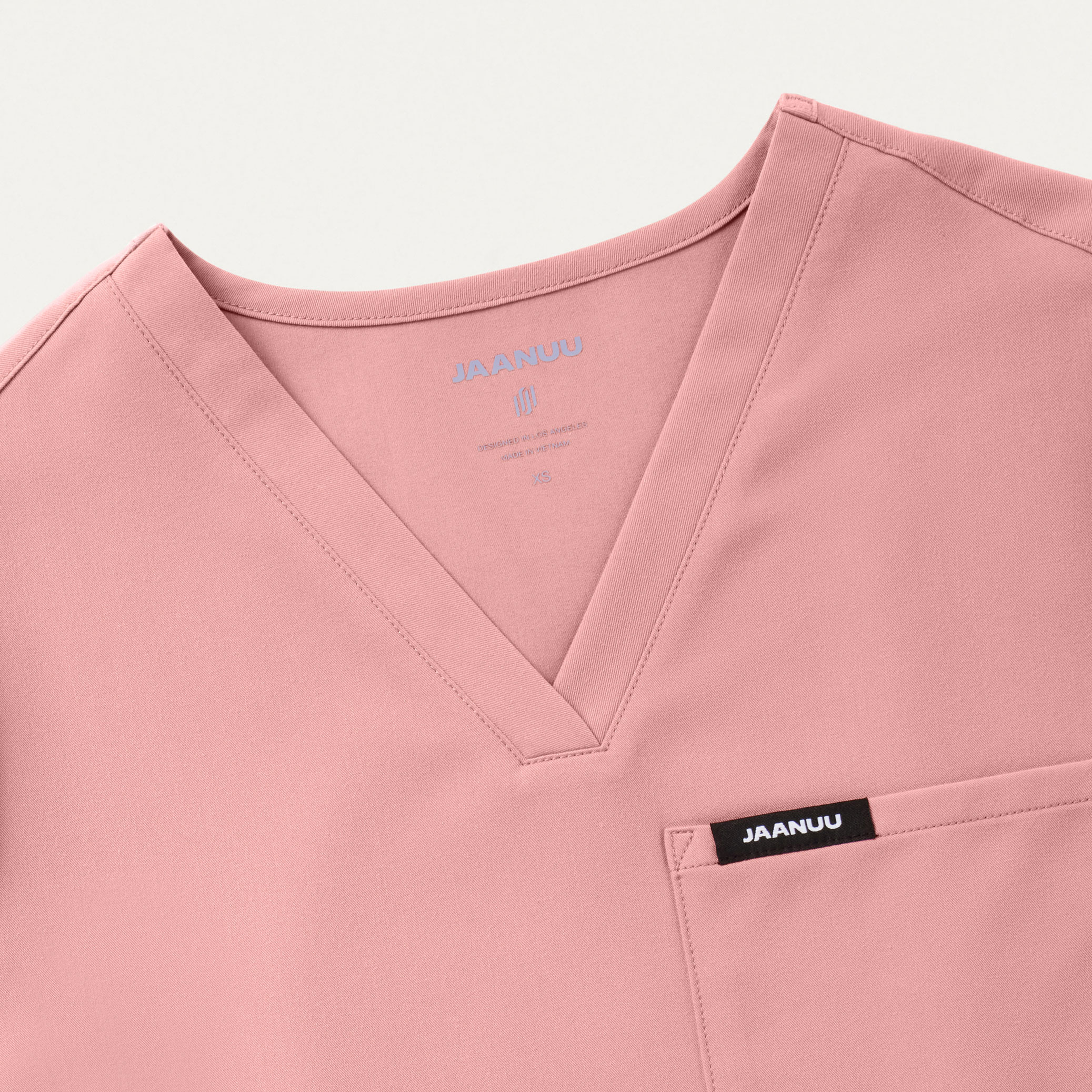 Rhena Essential 1Pocket Scrub Top in Mauve Women's Tops by Jaanuu